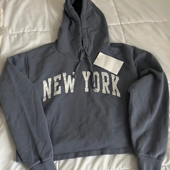 BRANDY MELVILLE • JOHN GALT Women’s Blue New York Hoodie NWT Sz S - Picture 1 of 5